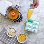 Baby Brezza Food Maker Deluxe, a food preparation device Baby Brezza Food Maker Deluxe, a food preparation device