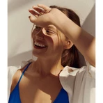 Nivea Sun Invisible Finish set, hydraterende zonnebrandcrème, SPF 50+, 150 ml + after sun verlengende lotion, 200 ml + gratis strandtasje