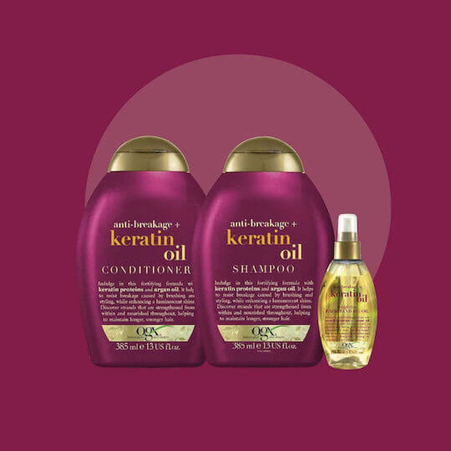 OGX Strength & Length + Keratin Oil Champú anticaída para cabellos frágiles 385ml