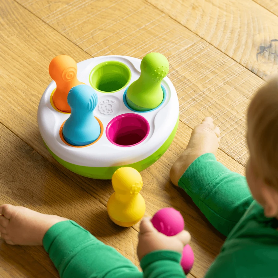 Spinny Pins - Bolos móviles - Emparejar, combinar y destreza para el bebé