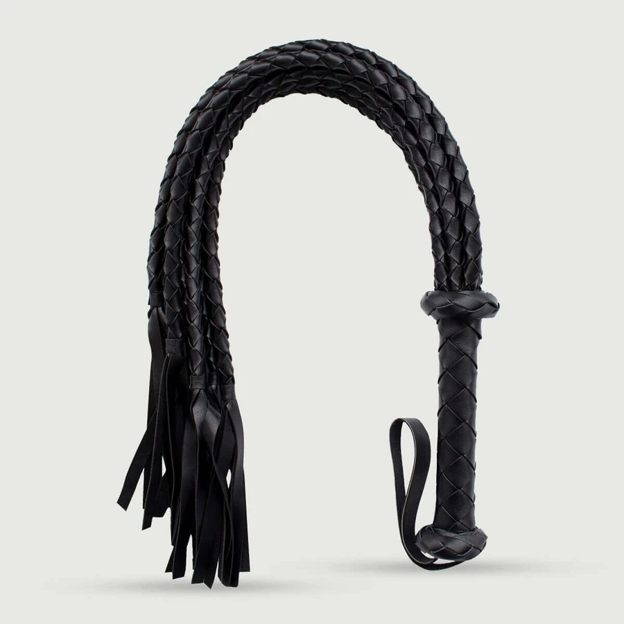 Flogger de cuero con textura trenzada y elegantes colas - Negro