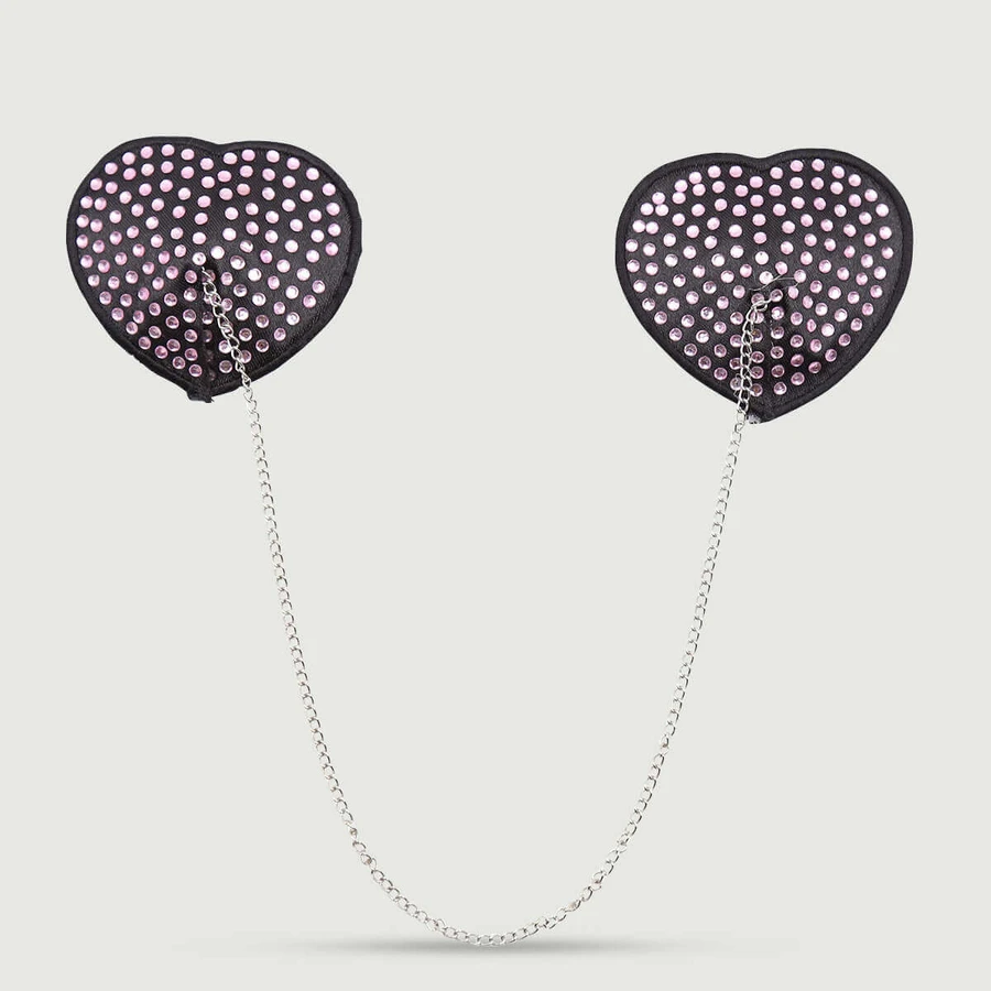 Pezoneras en forma de corazón con cadena y detalles metálicos - Negro