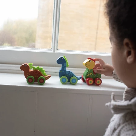 My first dinosaurs - set with wheels, Orange Tree Toys