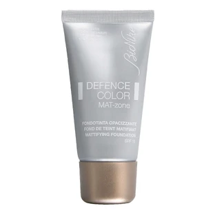 Base de maquillaje fluida Defence Color 404 Miel
