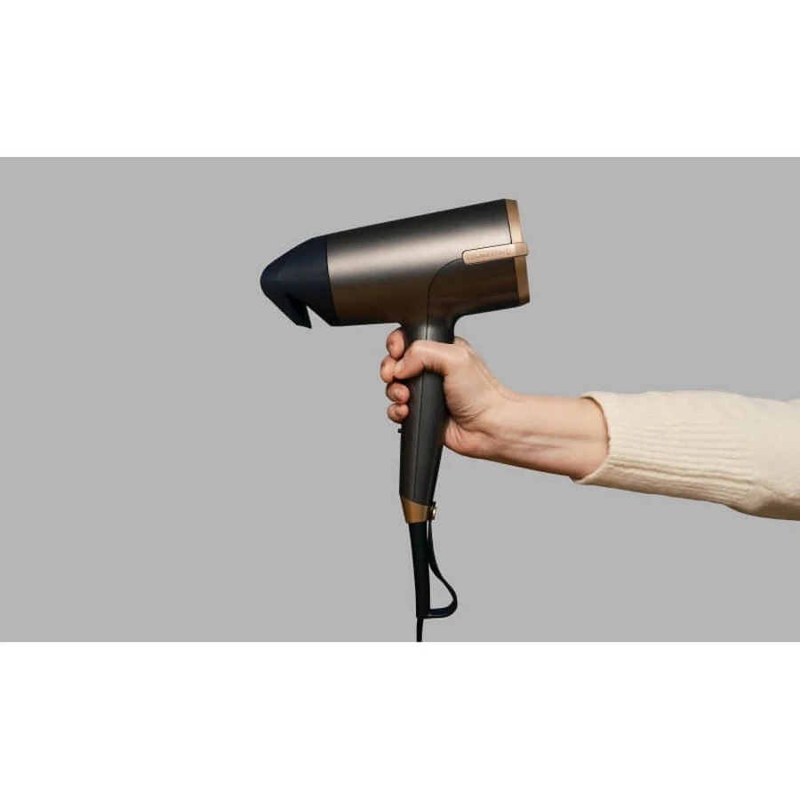 Remington One Dry &amp; Style – Haartrockner mit Thermacare-Sensor, Ionen-Technologie, 2000 W und 4 bronzefarbenen Aufsätzen