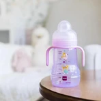 Mam Trainer+ Space Love - Biberón para bebés a partir de 4 meses con tetina de silicona de 220 ml, colores variados