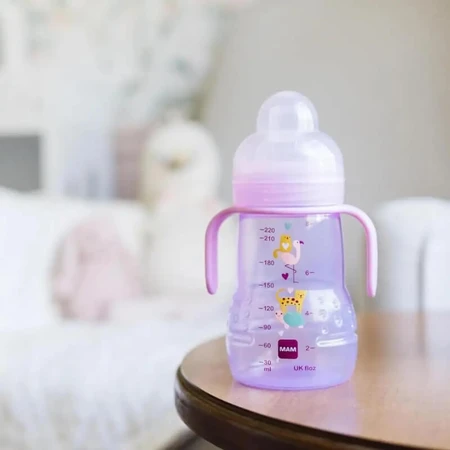 Mam Trainer+ Space Love - Biberón para bebés a partir de 4 meses con tetina de silicona de 220 ml, colores variados
