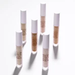 Astra Fluid Concealer Serum - Hydraterend, verhelderend concealer-serum nr. 04 Mid Dark