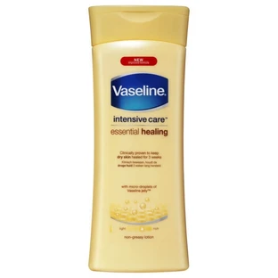Vaseline Intensive Care Essential Healing - Moisturizing and Regenerating Body Lotion for Dry and Sensitive Skin, 400 ml