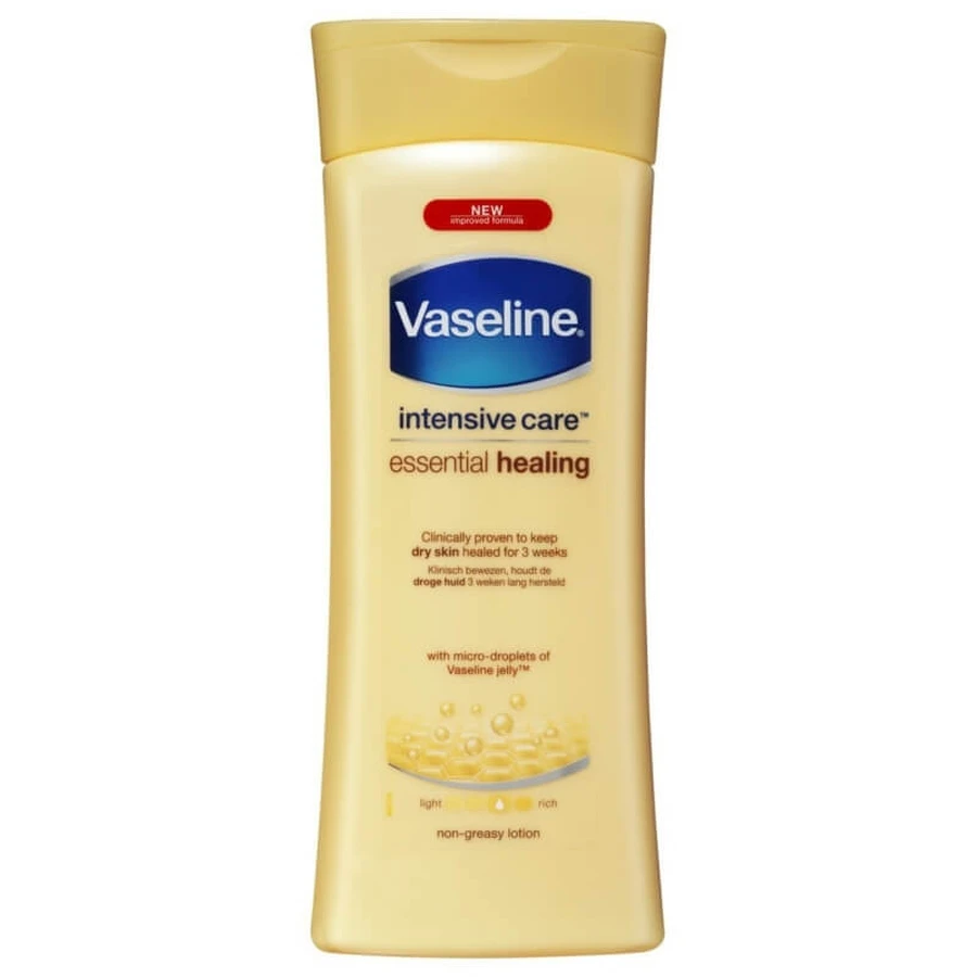 Vaseline Intensive Care Essential Healing - Moisturizing and Regenerating Body Lotion for Dry and Sensitive Skin, 400 ml
