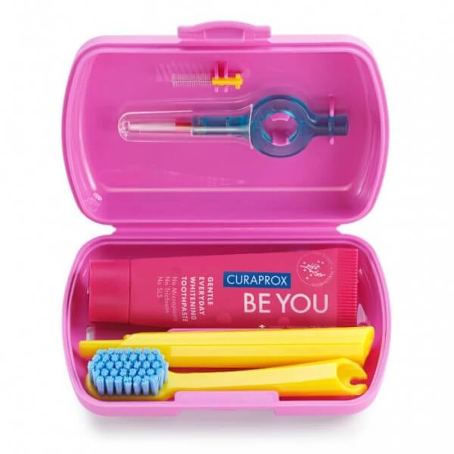 Curaprox | Kit de voyage comprenant un tube de dentifrice de 10 ml, une brosse à dents pliable, une brosse interdentaire et un étui de voyage rose | 1 pièce