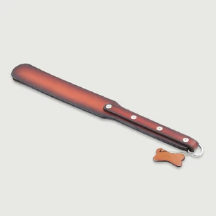 Leather Paddle with Studs and Bone Charm - Brown